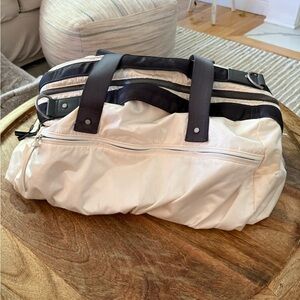 lululemon Go the Distance Cream and Black Travel Duffel 2011-2014